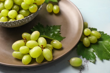 Ripe juicy grapes on plate, closeup