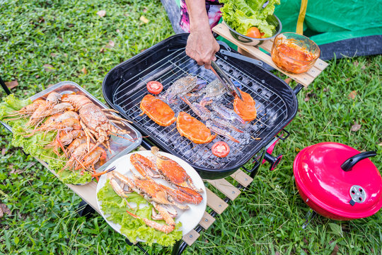 BBQ, grilled shrimp, crab and pork in the holiday as seafood camp.