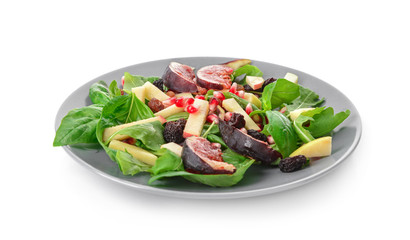 Plate with delicious fig salad on white background