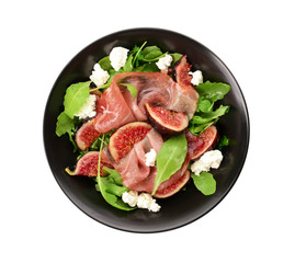 Plate with delicious fig salad on white background