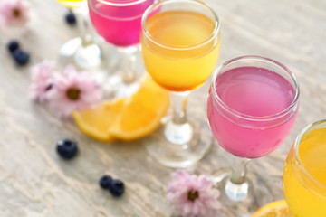 Glasses with delicious summer cocktails on table