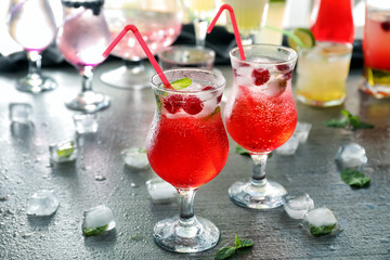 Glasses with delicious summer cocktail on table