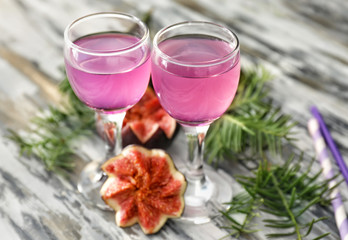 Glasses with delicious summer cocktail on table