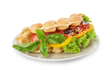 Plate with delicious bubble waffle on white background