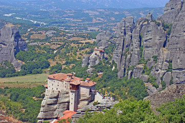 Fototapeta na wymiar Beautiful Landscape view of the amazing monasteries on the top of mountains and rocks in Meteora, Greece
