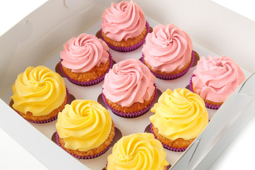 Delicious cupcakes in cardboard box