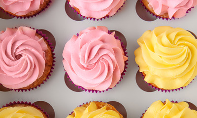 Delicious cupcakes in cardboard box