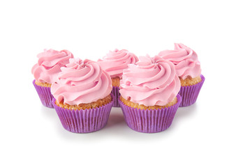 Delicious cupcakes on white background