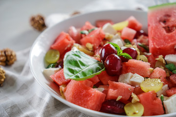 Delicious watermelon salad on plate, closeup