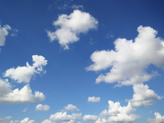The blue sky and beautiful white clouds with space for text above.