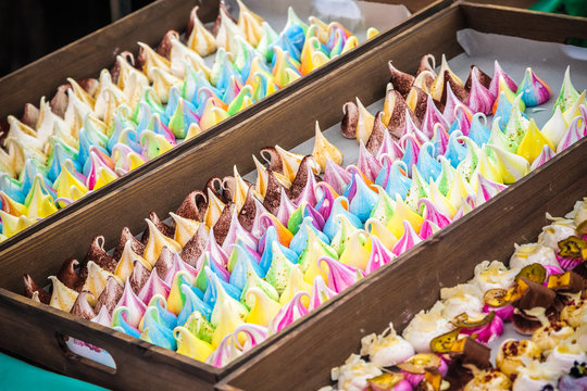 Colourful meringue kisses on display at Broadway Market in Hackney, East London