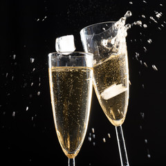 Glasses of champagne with splash