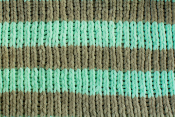 Knit. Woolen things. Bulky binding close-up. Hobbies for relaxing evenings. Knitted needlework....