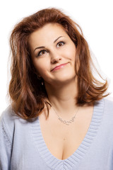 Fototapeta premium Young woman smiles, emotions, close-up