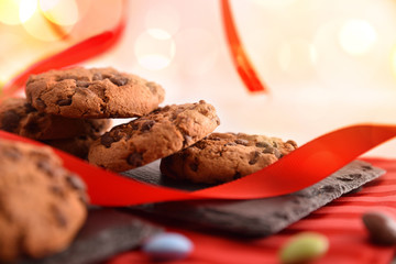 Celebration with chocolate cookies on slate tray front view detail
