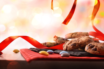 Celebration with chocolate cookies on slate tray front view