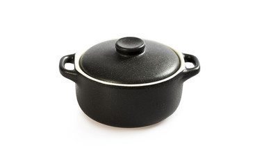 Cooking pot isolated on white. Black colour outside and white inside.