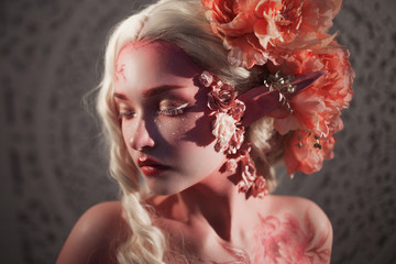 Young beautiful girl elf. Creative make-up and bodyart