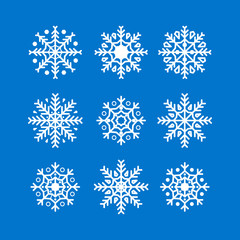 Fototapeta na wymiar Snowflakes New Year and Christmas decoration element design. Winter snowflakes silhouette. Snowflakes set white color isolated on blue background. Vector illustration