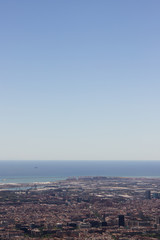 View on Barcelona city and mediterranean sea from Tibidabo hill