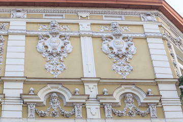 Fragments of facade of an Art Nouveau tenement house located on eastern frontage of Old Market Square in Przemysl, Poland 