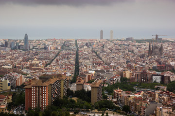 Cloudy view on Barcelona city from the mountain