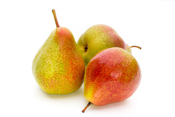 Fresh bio pear with leaves on isolated white background.
