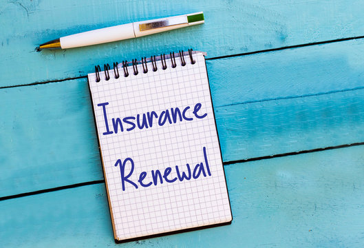 Conceptual Hand Writing Showing Insurance Renewal In Notebook