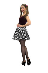 Young pin up girl in polka-dot dress, black stockings and in high heels shoes isolated on the white background.
