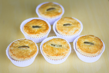 Patties, traditional Brazilian snack, filled with hearts of palm, chicken and meat.