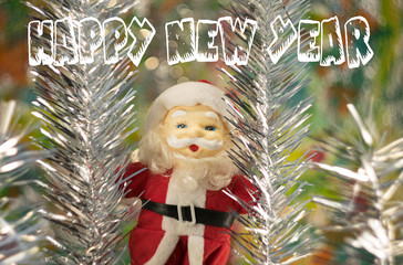  Congratulation Santa Claus "Happy New Year" on the background of New Year decorations with bokeh effect