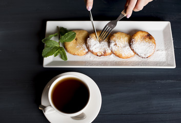 Russian traditional breakfasr syrniki, cottage cheese pancakes, homemade