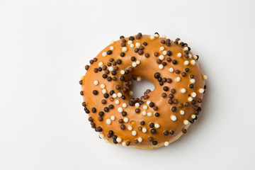 one donut on light background in minimal