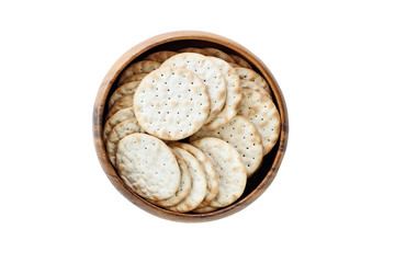 Isolated wooden bowl of water crackers over a white background. Clipping path included. Image shot from overhead.