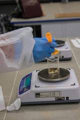 Working process in nanotechnology   laboratory of cosmetic production. Mixing components.