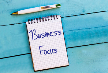 Conceptual hand writing showingBusiness Focus in small paper 