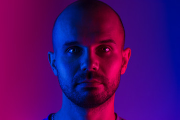 Portrait of a man. Dual tone lighting theme