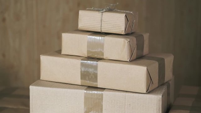 Postal parcels. Сardboard boxes of merchandise for shipment to international destinations.  Rotation