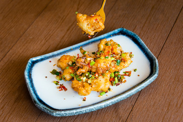 Fried squid with garlic, pepper, chilly and salt delicious Thai food