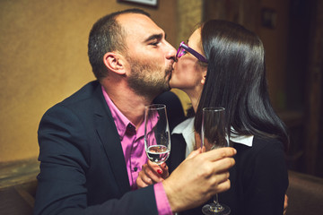 Emotional bartender spills champagne behind the bar