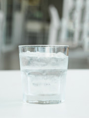 A glass of water with ice
