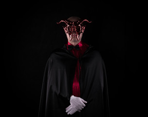 man in a devil mask halloween