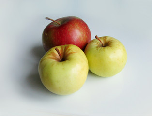 three apples on white background