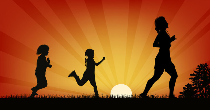 woman and children running at sunset