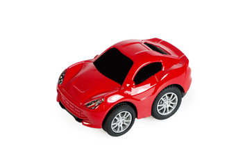 Red toy car on white