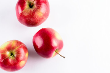 Fresh red apples isolated on white background