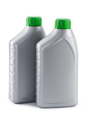 Plastic bottles from automobile oils isolated on a white background