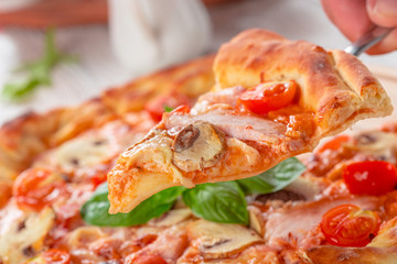 Delicious fresh pizza served on wooden table