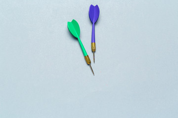 Blue and Green Darts arrows on light gray background