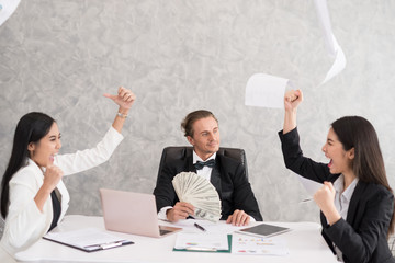 Celebrating success Cheerful young people looking excited. Successful entrepreneurs and business people achieving goals